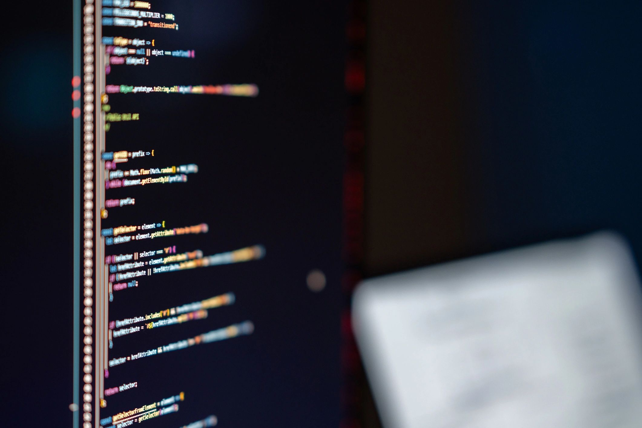 Close-up of a monitor with software and code