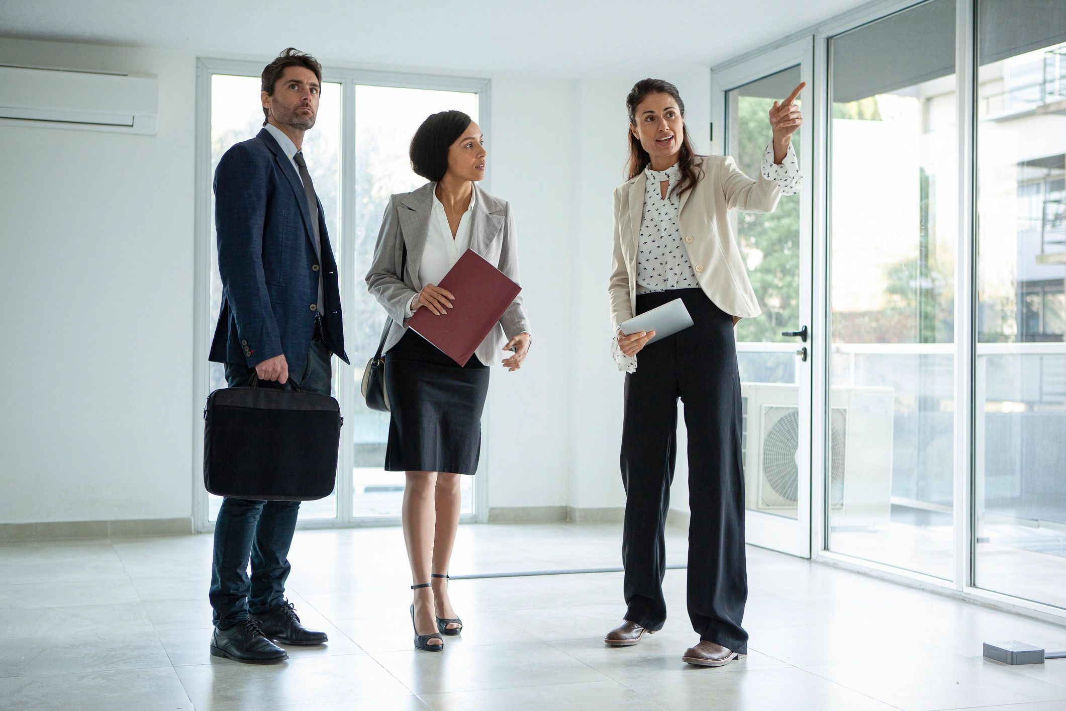 Real estate professionals meeting in an office