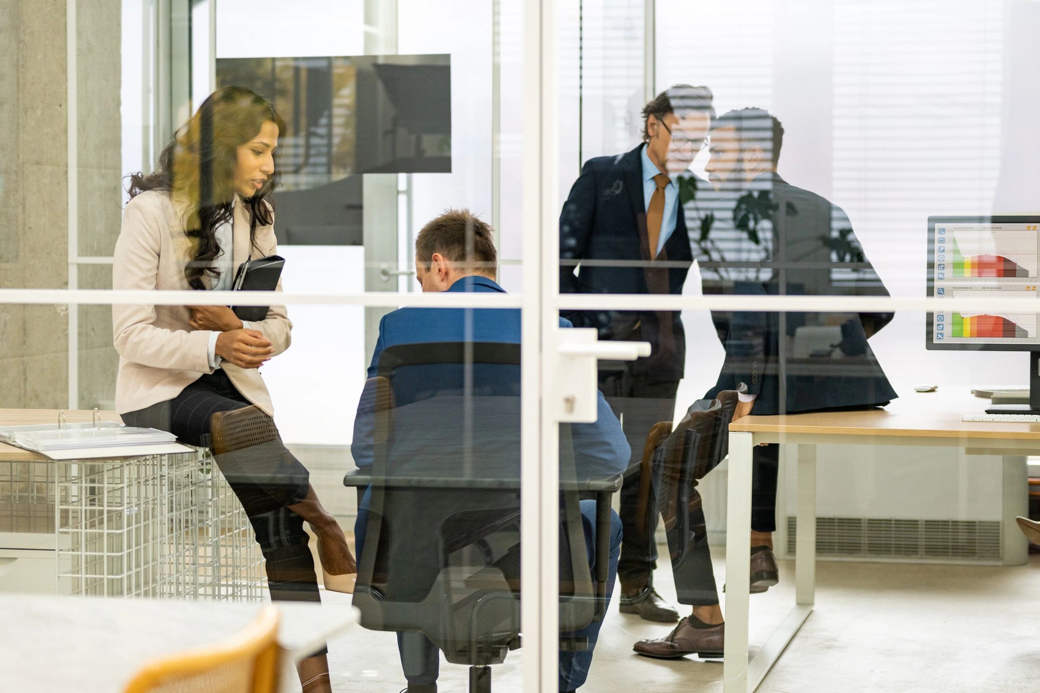 Mortgage professionals meeting in office